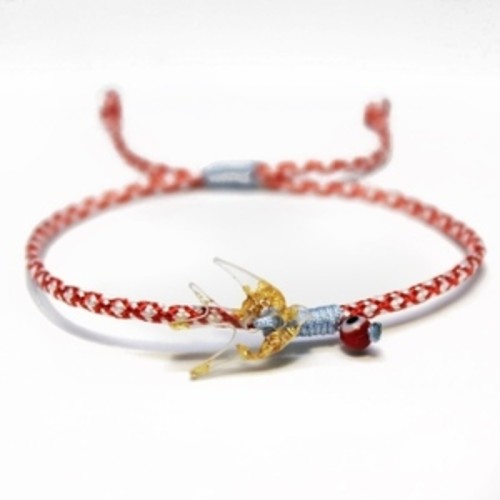 Handmade march bracelet with swallow plexiglass element and evil eye